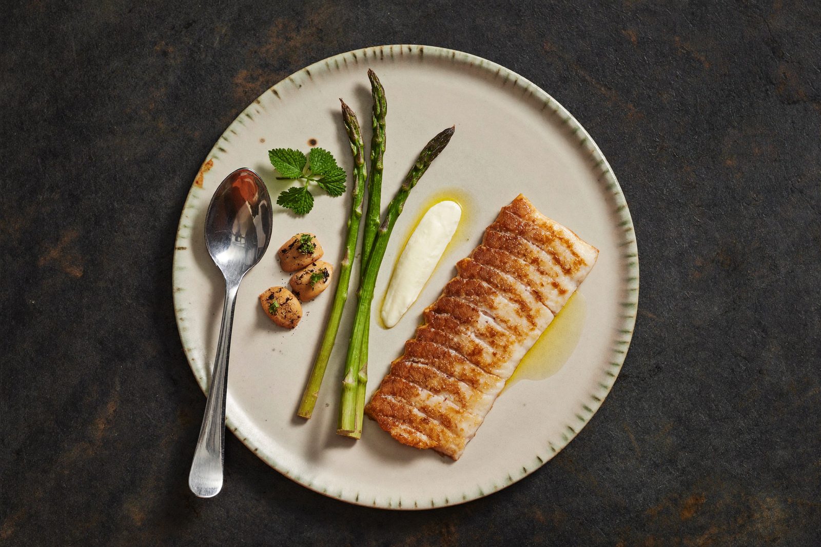 Finished plate on the pass, ready to run to the table