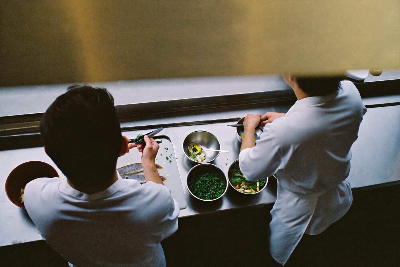 Mise en place laid out on the prep bench before opening